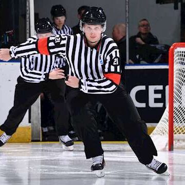 iihf-officials-skating-warmup